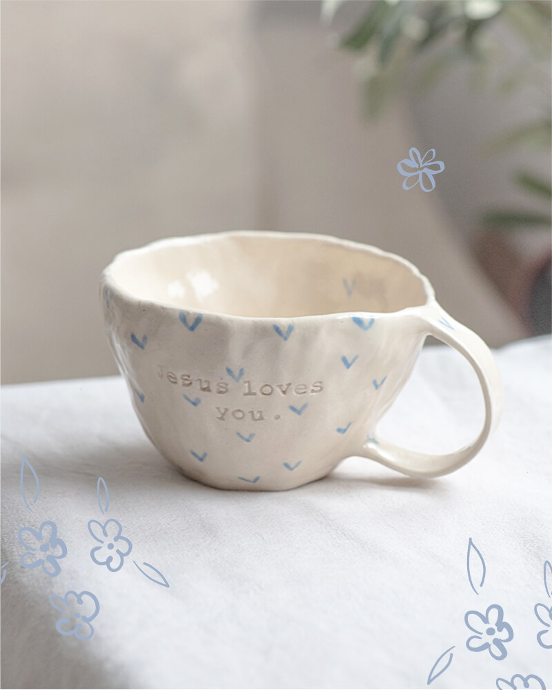 BLUE JESUS LOVES YOU MUG