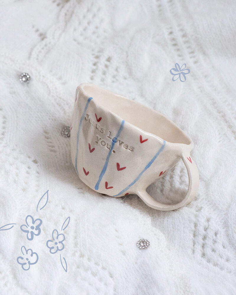 blue and red Jesus Loves you mug_